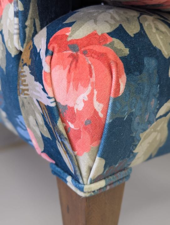Close-up of the fabric corner above a leg